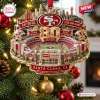 Front view of San Francisco 49ers 80th Anniversary Christmas Ornament hanging on a pine tree branch.