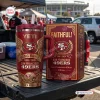 Front view of a San Francisco 49ers 80th Anniversary stainless steel tumbler with matching box on a truck tailgate.
