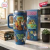 Front view of Scooby Doo Mystery Machine 40oz Tumbler with character graphics and matching box on a kitchen counter.