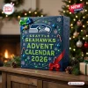 Front view of the Seattle Seahawks 2026 Advent Calendar on a wooden table with holiday decor.