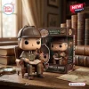 Front view of Sherlock Holmes 140th Anniversary Collectible Figure sitting in an armchair with a pipe and book.