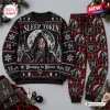 Front view of Sleep Token Worship The Winter Ugly Christmas Sweater paired with matching red and black patterned pants.