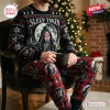 Front view of Sleep Token Worship The Winter Ugly Christmas Sweater on a person sitting by a tree.