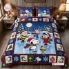 Front view of a Snoopy Christmas Ice Skating Bedding Set featuring cartoon characters ice skating under a snowy moonlit night.