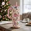 Front view of a Snoopy Christmas Pink 40Oz Tumbler featuring festive cartoon graphics on a wooden table.