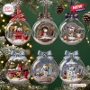 Front view of six clear globe ornaments featuring miniature holiday scenes with Snoopy Happy Holidays designs.