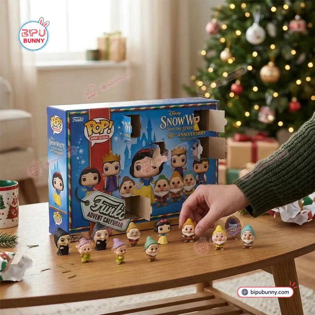 Opening the perforated numbered doors on the Snow White 90th Anniversary 1937 to 2027 Advent Calendar to reveal 3D miniature vinyl figures