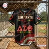 Front view of a black baseball jersey featuring Juneteenth text, red fist graphic, and Greek letters.