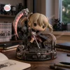 Front view of Soul Eater Maka Albarn collectible figure holding a scythe on a gothic stone base.