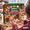 Child opening the Squishy 24 Days Of Dumpling Advent Calendar with toy figures.
