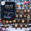 Front view of a Star Trek Christmas 2026 Advent Calendar box alongside twenty-one vinyl figurines and collectibles.