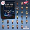 Front view of Star Trek Christmas 2026 Advent Calendar box alongside miniature character figurines and pins.