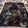Top view of Star Wars 50th Anniversary Cosmic Blanket spread on a white bed.