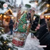 Hand holding a Star Wars Christmas Tree 40oz Tumbler Cup outdoors in snow.