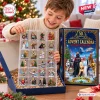 Boy opening Star Wars Galactic 50th Anniversary Advent Calendar with figures.