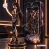 Side view of the Stellar Blade Eve Vinyl Figure Statue standing beside its branded packaging box.