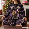 Front view of a Stevie Nicks Christmas Celestial Sweater and Jogger Set in purple and black.