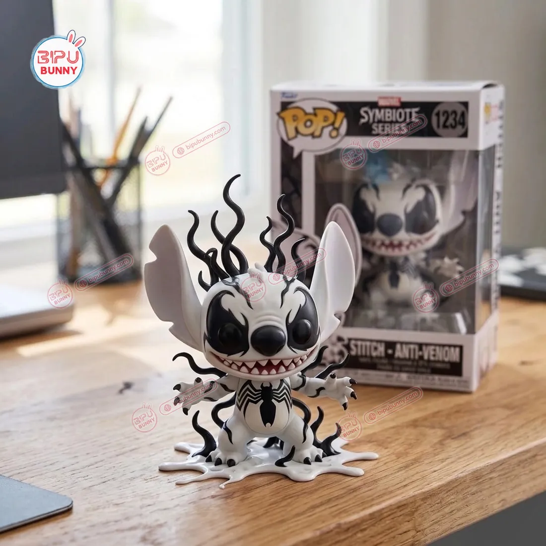 Close-up of Stitch Anti-Venom Symbiote vinyl figure on a wooden desk beside its 1234 Symbiote Series collector box