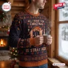 Side view of a man holding a mug while wearing a Stray Kids Christmas Custom Name Ugly Sweater with reindeer patterns.