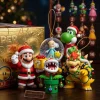 Closeup view of holiday figurines including Mario in Santa suit and Yoshi from the Super Mario Bros. 40th Anniversary Mushroom Kingdom 2026 Advent Calendar.