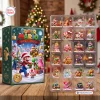 Front view of Super Mario Christmas Advent Calendar box with twenty-four collectible figures visible in a plastic tray.