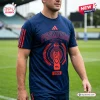 Front view of a person wearing a navy blue Sydney Roosters 2026 Premiers rugby shirt with red graphics.