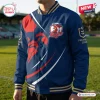 Front view of Sydney Roosters 2026 Premiers varsity jacket in blue with red rooster crest.
