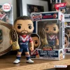 Front view of Sydney Roosters James Tedesco 2026 vinyl figure standing beside its branded box.
