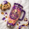 Front view of the Taco Bell 65th Anniversary Handle Tumbler featuring a purple tie-dye pattern and anniversary text.
