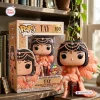 Front view of Tay 100 Weeks Billboard 200 Vinyl Figure displayed beside its themed box on a wooden shelf.