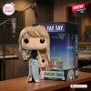 Front view of the Taylor Swift 2026 MTV VMA Vinyl Figure next to its branded box.