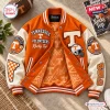 Front view of an orange and white Tennessee Volunteers varsity baseball jacket laid flat with patches.