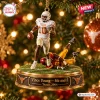 Front view of a Texas Longhorns Vince Young 4th and 5 Ornament hanging on a Christmas tree.