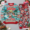Front view of The Beach Boys Turquoise Christmas Sweater And Jogger Set with surfer Santa graphic.