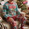 Front view of The Beach Boys Turquoise Christmas Sweater And Jogger Set featuring band portraits and surfing Santa.