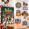 Front view of The Beatles Christmas Advent Calendar box with five hanging ornaments on a wooden table.