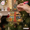 Close-up view of The Eagles 55th Anniversary Christmas Ornament hanging on a tree.