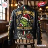 Back view of The Grinch Holiday Mischief Leather Jacket featuring green character graphics and text on a chair.
