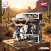 Front view of The Lone Ranger 77th Anniversary Vinyl Figure riding a white horse beside its packaging box on a wooden crate.
