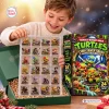 A young boy smiling while holding a transparent tray of miniature figures next to the TMNT Chibi Sewer Squad Advent Calendar.