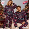 Front view of two models wearing a Tool Band Christmas Sweater and Jogger Pants Set with festive geometric eye motifs.