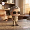 Front view of the Top Gun Viper Tom Skerritt Collectible Vinyl Figure wearing aviator sunglasses and khaki uniform on a desk.