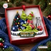 Front view of Toronto Maple Leafs x Montreal Canadiens Grinch Christmas Ornament in a red gift box.