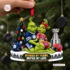 Toronto Maple Leafs x Montreal Canadiens Grinch Christmas Ornament hanging on a tree.