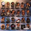 Collection of stylized figures and accessories from a Travis Scott Advent Calendar on display.