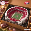 Top view of a plush University of Alabama stadium pillow inside a gift box.