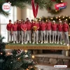 Front view of the USA Team Presidents Cup Champions Christmas Ornament hanging on a tree.