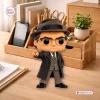 Front view of Vince Lombardi The Pope 113th Anniversary Vinyl Figure on a desk.