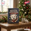 Front view of Westie Troublemakers Christmas Advent Calendar on a wooden table with a Christmas tree.