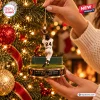 Close-up of Willie Mays New York Giants The Catch ornament hanging on a lit Christmas tree.